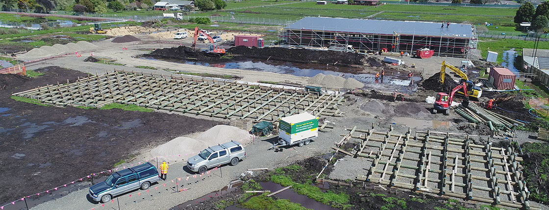A testing ram checks the quality of a pole before it is set aside for dispatch.